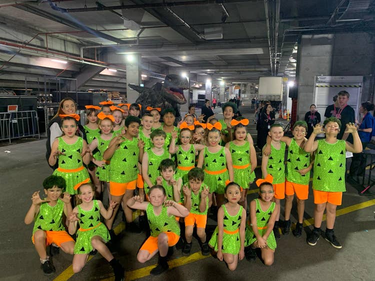 A group of students ready to perform a dance routine